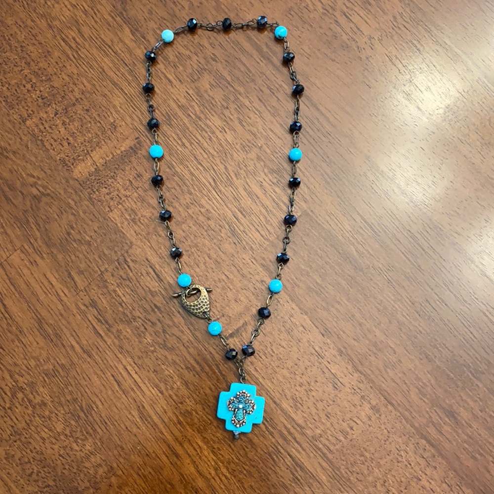 Bronze, black, turquoise cross necklace